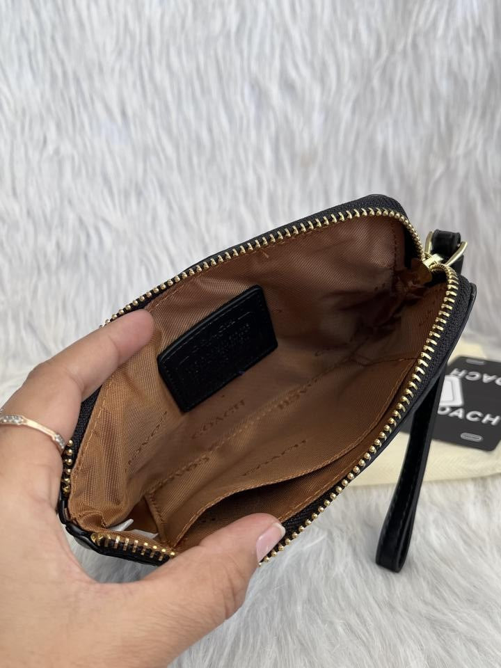 Coachh Emboss Wristlet With DustCover