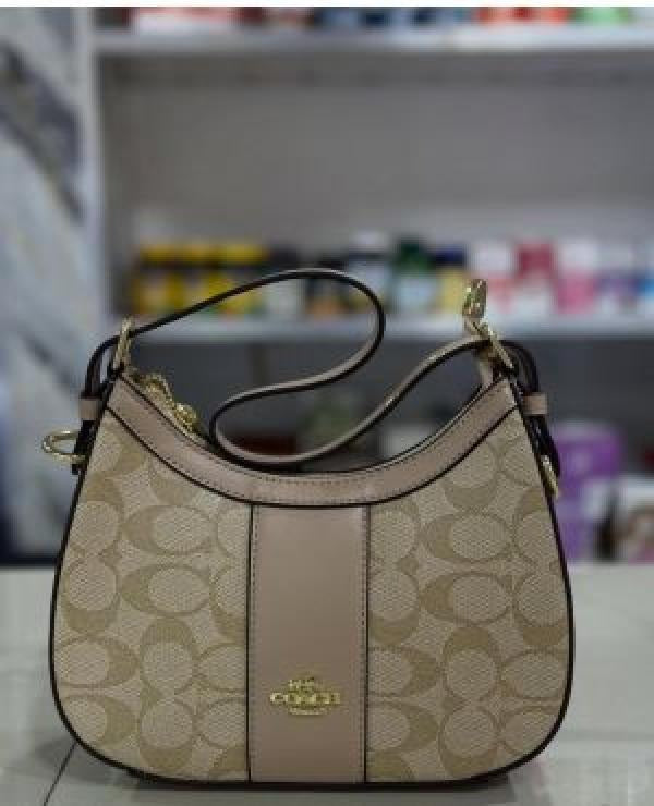 Coacch kleo hobo bag in signature canvas bag with box