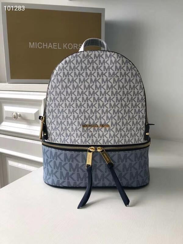 Michaell Korrs Rhea backpack with dust cover