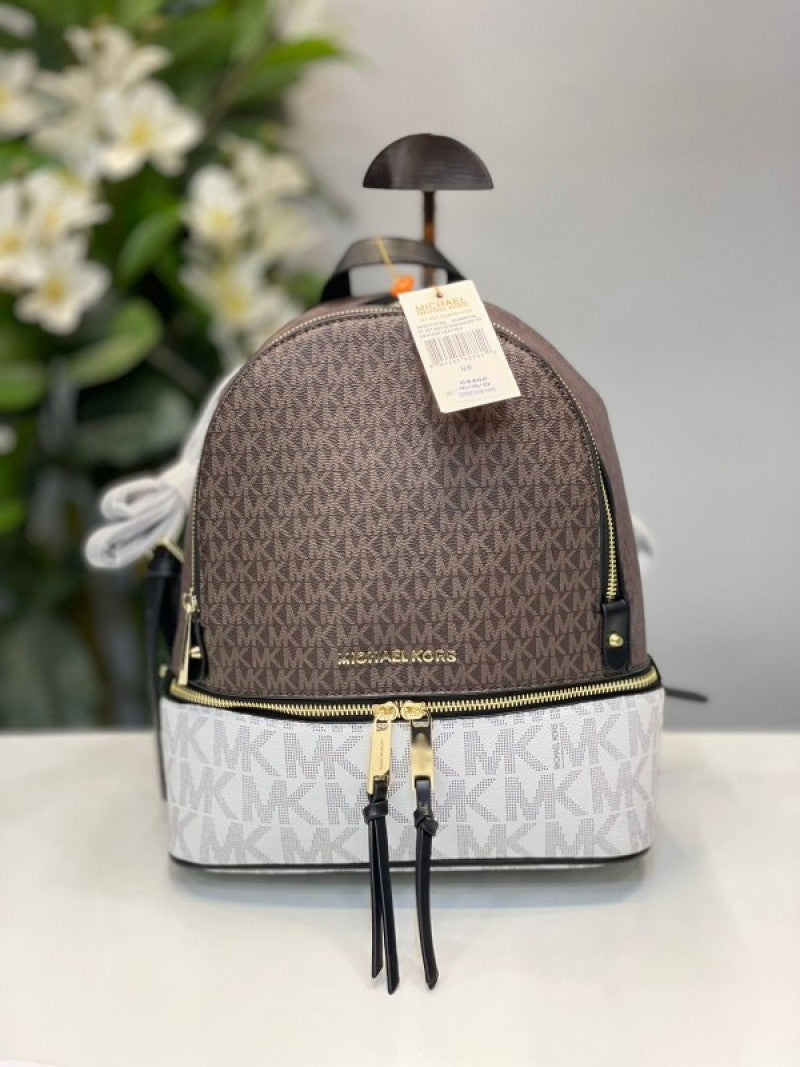 Michaell Korrs Rhea backpack with dust cover
