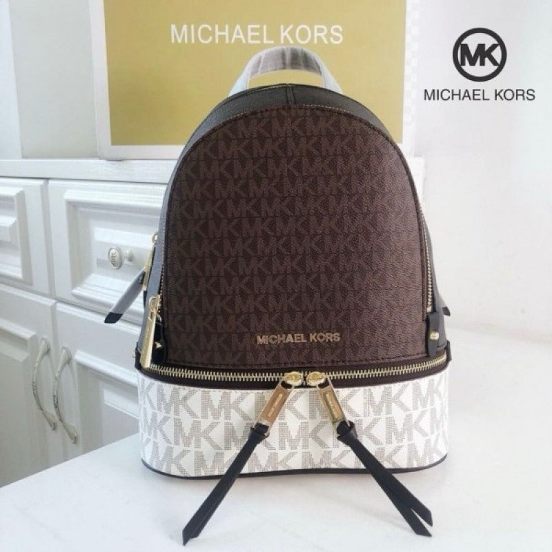 Michaell Korrs Rhea backpack with dust cover