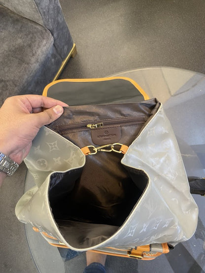 Louis vuitton Hudson Backpack In Blocked Signature Canvas