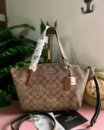 Coach kelsey handbag with long strap with dust cover