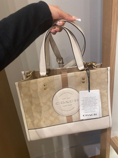 Coacch dempsey carryall signature jacquard stripe and patch with box