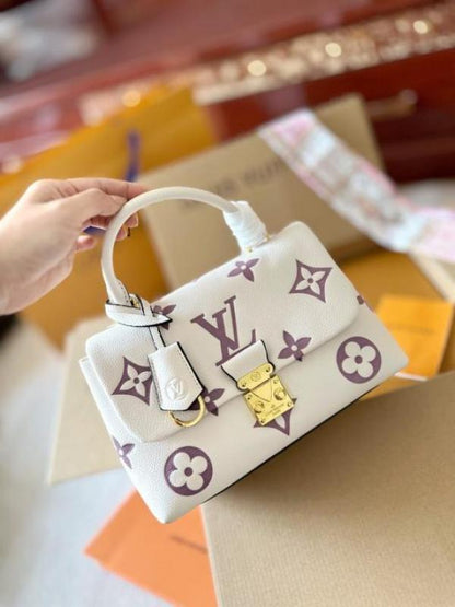 louiis vuitton madeleine handbag with packing box