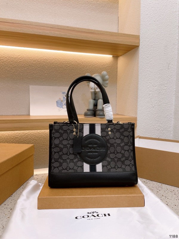Coacch dempsey carryall signature jacquard stripe and patch with box
