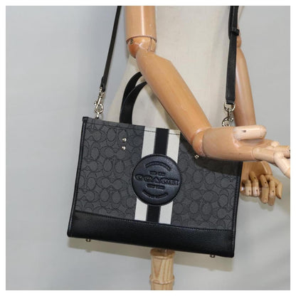 Coacch dempsey carryall signature jacquard stripe and patch with box