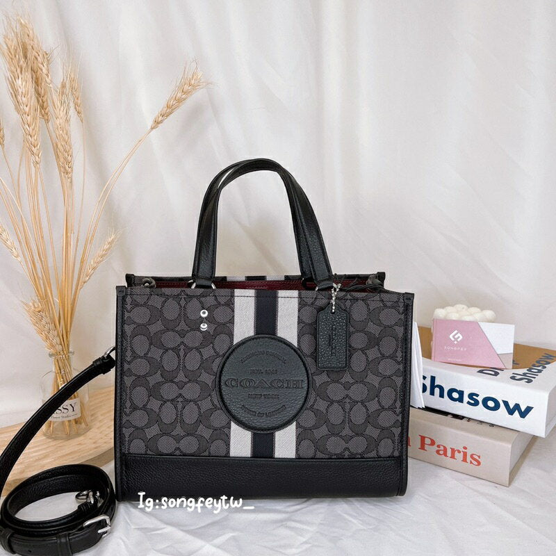 Coacch dempsey carryall signature jacquard stripe and patch with box