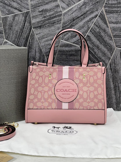 Coacch dempsey carryall signature jacquard stripe and patch with box